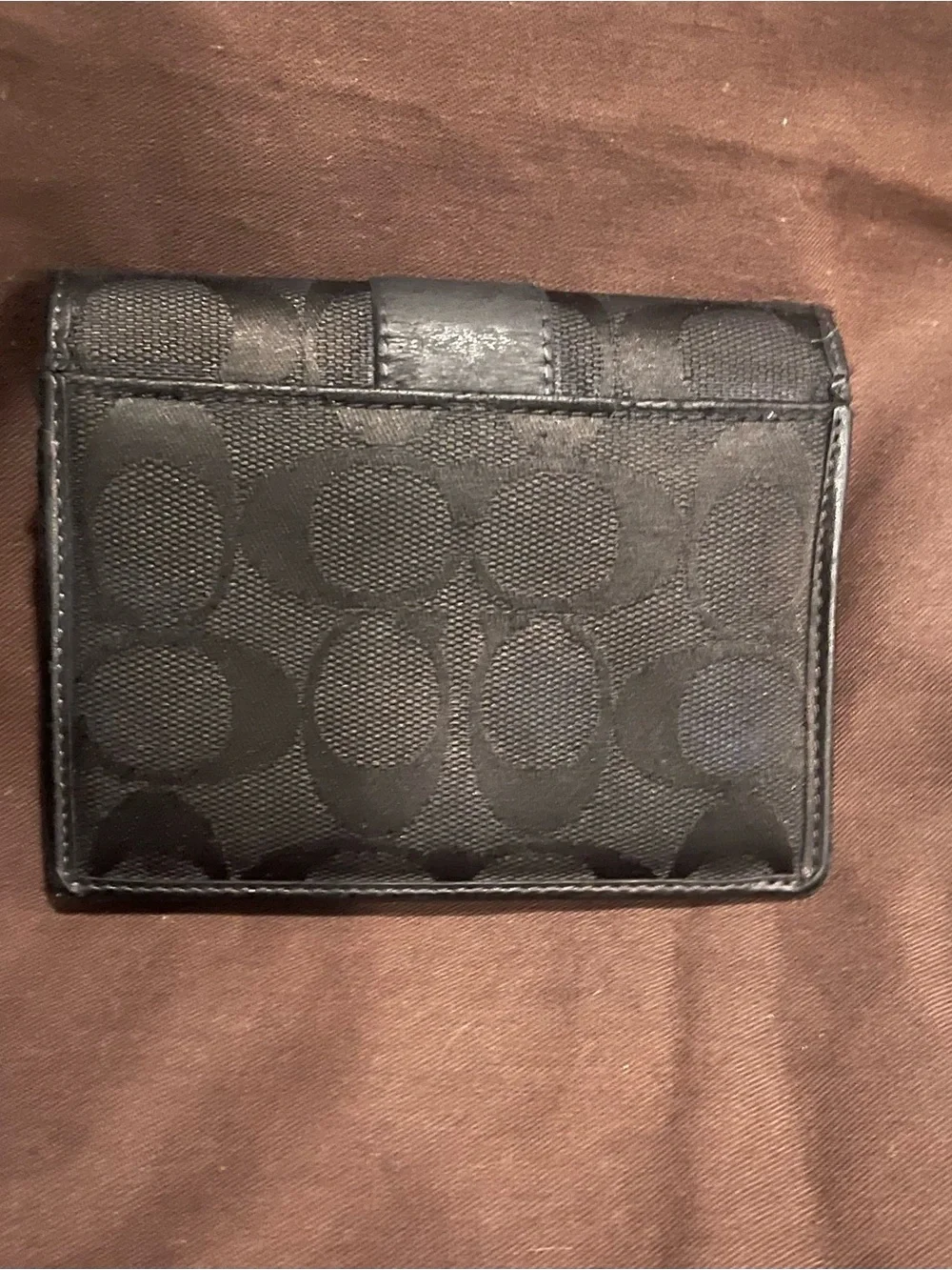 Coach compact bi